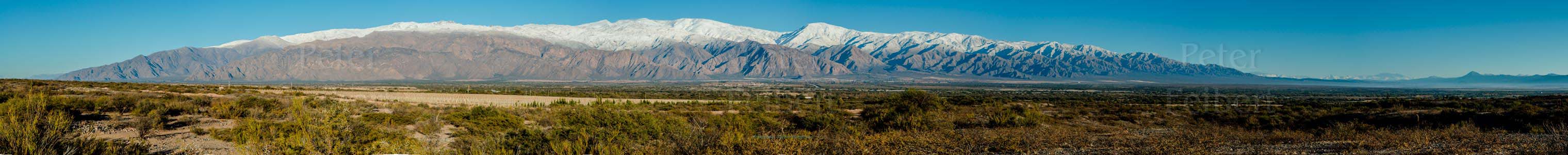 Snow in the mountains behind the town of Cafayate, Calchaquí valley, Salta, Argentina.