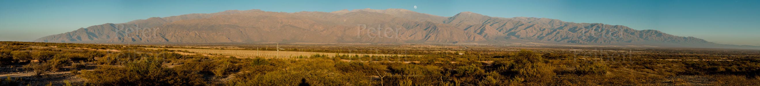 The setting moon, environs of the town of Cafayate, Calchaquí valley, Salta, Argentina.