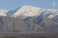 Snow in the mountains behind the town of Cafayate, Salta, Argentina