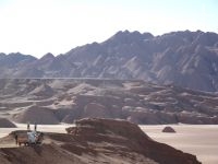 Travelers on the Labyrinth desert, near Tolar Grande, on the Altiplano of Salta, Argentina