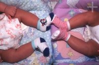 The babies Isadora and Thomas Feibert's legs (twins)