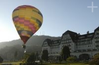 Hot air balloon in front of the Quitandinha Palace, Petropolis, RJ, Brazil